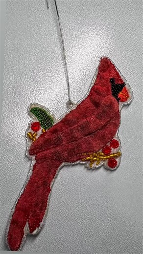 Just finished this cardinal ornament, featuring traditional caribou hair tufting with intricate beadwork and embroidery. The rich red body is made from genuine caribou hair tufts, while the festive details are hand-beaded with seed beads and accents. Backed with soft brain-tanned buckskin for that perfect traditional finish. There’s something magical about working with natural materials and keeping these traditional techniques alive. #NativeArt #IndigenousArt #CaribouHairTufting #Beadwork #Tradi