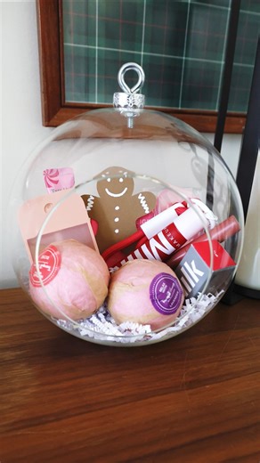 Liz Fenwick DIY on Instagram: "This glass ornament makes the cutest gift box! 🎁 Easy, reusable, and so fun to fill! Comment “GIFT” for all the details 👇 #giftideas #holidaydiy #christmasdiy #budgetfriendly"