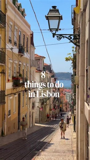 8 best things to do in Lisbon ⬇️ 1. Explore Alfama: Alfama is Lisbon’s oldest neighbourhood, made up of narrow streets and historic buildings. It’s where you’ll find two of the city’s most iconic viewpoints, Miradouro de Santa Luzia and Miradouro das Portas do Sol. 2. Feira da Ladra: If you’re in Alfama on a Tuesday or Saturday, don’t miss the Flea Market (the Feira da Ladra), one of the oldest markets in the city. 3. LX Factory: LX Factory is an open industrial space with over 50 shops, restaur