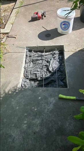 PatchingConcrete foot path after pipe works done.