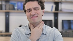 Coughing Sick Creative Man in Office