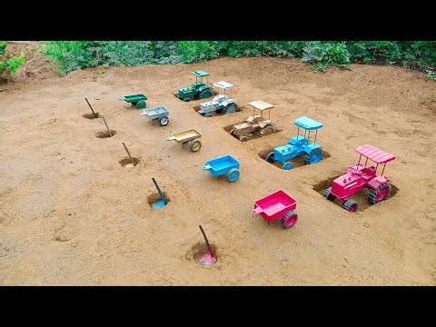 The tractor trolley was filled with soil and the tractor was pulled out of the pit and attached#349