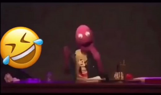 Humorous Puppet Performance at the Desk