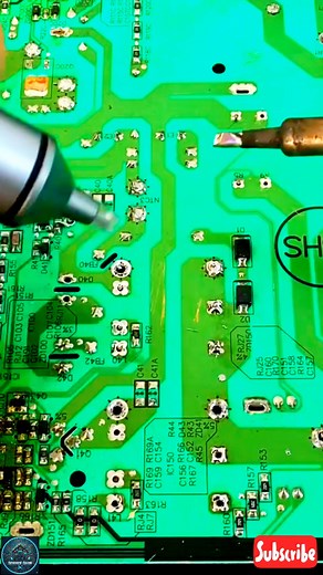 The video displays an individual performing work on a printed circuit board (PCB) #howto #servicing #soldering #solderingtips | Fix Factor