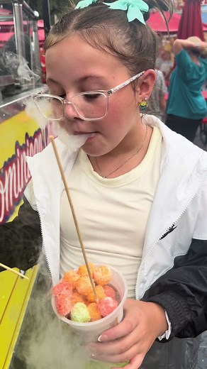 Trying dragons breath for the first time! They rated it 10/10 and was willing to walk in the rain for more🤣 #dragonsbreath #foodtiktok