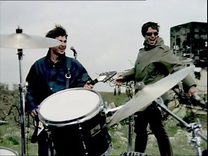 Click here to watch the full video for D'You Know What I Mean? (NG's 2016 Rethink): https://www.youtube.com/watch?v=jyJU2136ym4 Directors Dom & Nic and members of the original production team re-worked the video, editing it to Noel Gallagher’s new 2016 version of the track and adding previously unseen footage. The video has been completely re-graded and is now in HD. To get hold of the track as a download or to stream click here: https://oasis.lnk.to/DYKWIMNGFA | Oasis