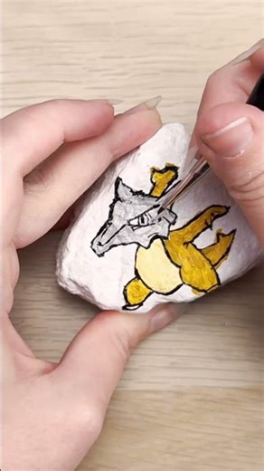 Painting The Pokedex - Day 105 Marowak #rockpainting #pokémon #marowak #paintingthepokedex #rocks