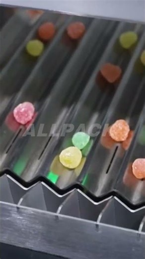 How gummy candy packed into bottle by the 24-channel tablet counting machine?