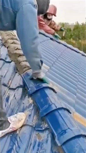 Technique Installing Roof Ridge Tiles With Precise Cement Application