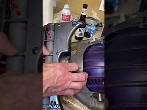 Replacing a brush assembly on Dyson DC25 vacuum