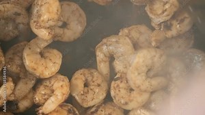 Time-lapse. Cooking seasoned shrimp for chipotle shrimp tacos Stock Video