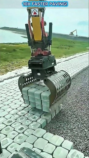Automated Concrete Paver Installation with Hydraulic Excavator Clamp.