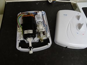 Electric shower , checking and replacing PRD pressure relief valve device outlet ( leaking bottom )