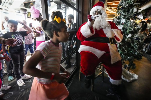 Santa brings early Christmas joy to Houston’s Third Ward at free toy giveaway