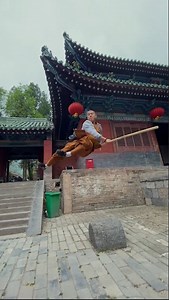 68K views · 411 reactions | Leaping off ancient courtyard walls and pirouetting with a wooden staff in hand, a Shaolin monk shows the speed, strength, and dexterity of Shaolin kung fu, a legendary form of Chinese martial arts in which the staff is revered as the "chief of weapons." #Heritage #BRICS #FunChina | China Plus Culture | Facebook