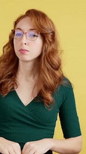 clip-3466276373-redheaded-woman-glasses-staring-camera-disbelief