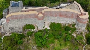 Ascending drone footage of the historic Poenari Castle, situated on top of a mountain in Romania
