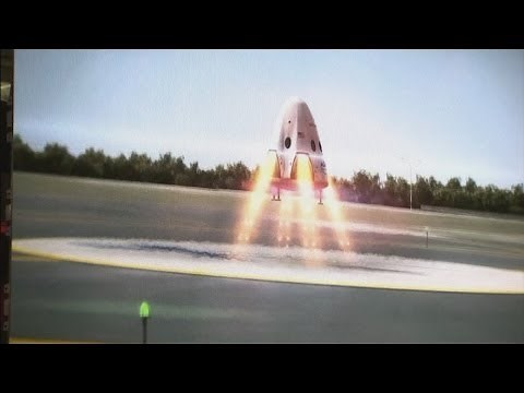 SpaceX unveils new Dragon V2 manned spacecraft