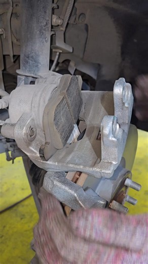 Inayat Ur rahman on Instagram: "Ford Taurus front brake pads installation trick #diy #automotive"