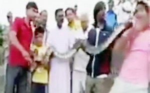 Constricted by a selfie, stung by a python, photo op goes awry