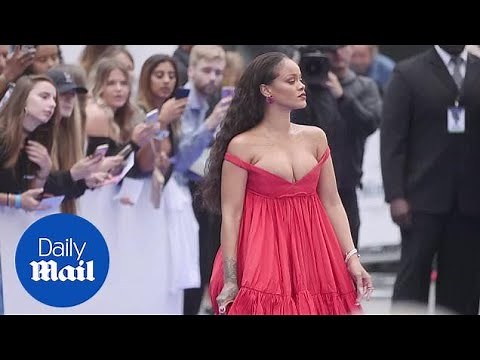 Singer Rihanna stuns in low cut red dress at London Valerian Premiere - Daily Mail