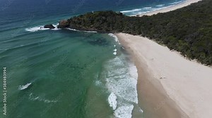 Ocean Waves At Fingal Head Beach - Lush Green Forest - Fingal Head Causeway And Lighthouse - New South Wales, Australia. - aerial drone shot