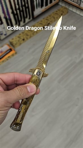 shinny golden dragon stiletto spring assisted knife