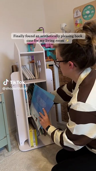 No more falling all over books that are left on the floor #tiktokmademebuyit #parenthacks #bookstorage #cleantok #rotatingbookcase
