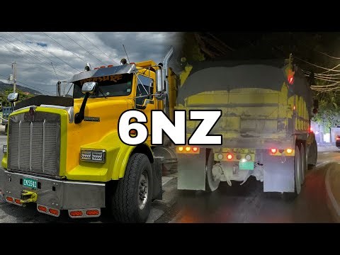 Heavy Spec KW T800 unleashes the power of its 6NZ CAT engine, dominating steep and narrow roads