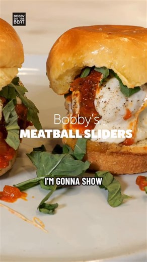 Bobby Flay on Instagram: "Meatball Parm Sliders for @katieleebiegel from this week’s @bobbyonthebeatpod! 👉Link in my bio for the full episode!! And get this recipe from Sundays with Sophie on BobbyFlay.com. I’ll add the recipe link to stories today."