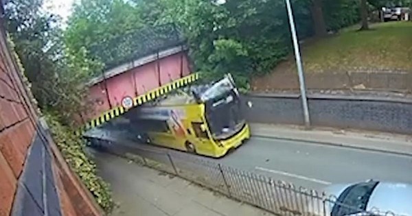 Eccles: CCTV captures moment bridge rips roof off double-decker bus
