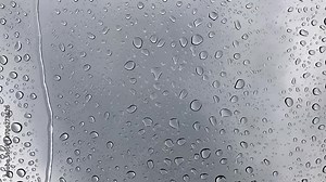 Rain on Glass Window – Abstract Background with Raindrop Texture