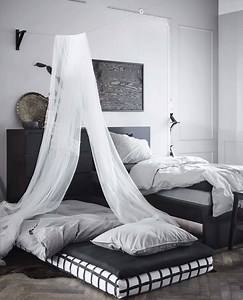 Store several beds in one spot. Simply stack a few mattresses on one bed frame. Cover them with contrasting textiles for a cool, graphic effect and unstack when guests show up. | IKEA