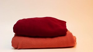 Female Hand On Stacks Warm Sweaters Stock Footage Video (100% Royalty-free) 1043458138 | Shutterstock