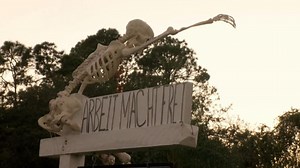 Fla. woman decorates yard with Hitler-saluting Holocaust skeletons