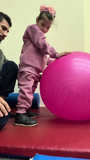 Using thera ball is an effective way to enhance proprioception and overall body awareness , Especially with children who suffer from a lack of body schema . #العلاج_الطبيعي #صناع_الأمل #شلل_دماغي