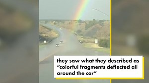 Watch this car drive through the end of a rainbow