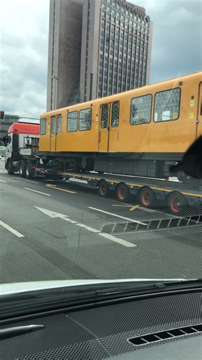 Berlin Tram Through Busy Crossroads