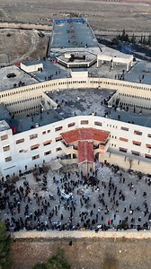 Thousands of people have gathered outside Syria's Saydnaya prison, dubbed a "human slaughterhouse" by rights group Amnesty International. Following Assad's downfall, prisoners who were victims of his government are being released and reuniting with relatives. #AFP 🎥📸 Omar HAJ KADOUR ADMSP #Syria #Saydnaya | AFP News Agency
