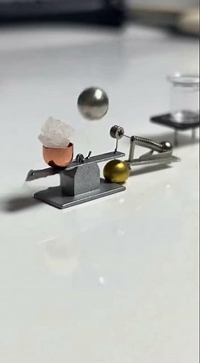 World’s Smallest Rube Goldberg FAIL: A Sugar Grain Causes Total Destruction