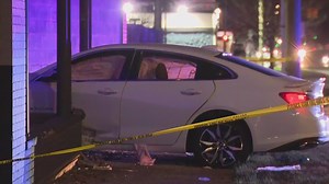 Shooting victim crashes through 8 Mile business