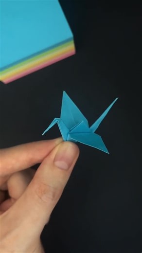 @foldgodz on Instagram: "Making an origami crane with a sticky note… can you do this? #art #handmade #diy #animals #paper"