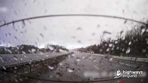 Shocking video shows the moment car loses control on M61 and skids backwards down icy motorway