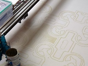 This Arduino-controlled machine draws on textile with wax | Arduino Blog