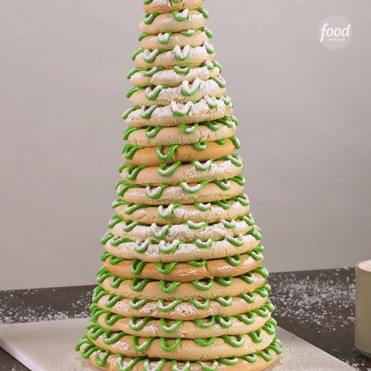 Kransekake might be the prettiest holiday dessert we've ever seen 😍 Save the recipe on your #FoodNetworkKitchen app: https://food-network.app.link/lnIydZH8a2! | Food Network
