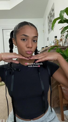 Slick back braided pigtails with bows ✨I loved this look im about to do this all the time now! #slickbackpigtail #braidedpigtails #hairtutorial #braidingmyhair #hairinbow #braidswithbow #cutehairstyle #naturalhairstyle #easyhairstyle