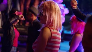 Footage of a crowd or group of young, stylish multi-ethnic people during colorful party in different clothes . Dancers having fun dancing at a party . Shot on RED HELIUM Cinema Camera in slow motion .