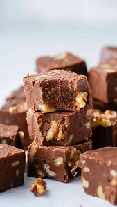 You cannot go wrong when you follow my 7 easy steps to perfect fantasy fudge! This no-fail fudge recipe is a creamy chocolate fudge packed with marshmallow creme and walnuts that everyone will rave about! Comment “recipe” and I’ll send it your way! https://thefirstyearblog.com/fantasy-fudge-recipe/ #fudge #fantastyfudge #christmas | The First Year