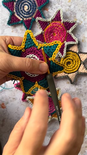 How are your Sparkle Stars doing? ⭐️🌟✨🤩 Did you make some? The surface slip stitching can be relaxing, too 😄 And just to remind, the next part of the Sparkle Mystery Make-a-Long will come out on Wednesday. Want to join? It’s still not too late. You can join by purchasing the ebook on Ravel here: https://www.ravelry.com/patterns/sources/mystery-sparkle-make-a-long/patterns I’m using @scheepjes Catona and Catona Shine yarns. #crochetstar #crochetpattern #crochet #surfacecrochet #slipstitch #cro