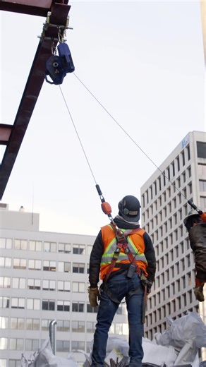 EllisDon Corporation on Instagram: "Falls from height are a leading cause of serious injuries in construction. That’s why EllisDon has moved to a 6-foot fall protection standard in 2025. On this site, an innovative retractable trolley system keeps crews safely tied off while unloading from flatbeds."